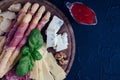 Wooden board full of mediterranean appetizers Royalty Free Stock Photo