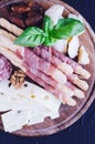 Wooden board with appetizers Royalty Free Stock Photo