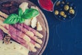 Wooden board full of mediterranean appetizers Royalty Free Stock Photo