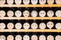 Wooden board lucky charm with face image at Kawai shrine in Kyoto, Japan