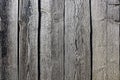 Wooden board made of gray planks. Texture vertically. Royalty Free Stock Photo