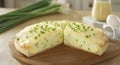 On a wooden board is a savory egg and herb pie that has been garnished with a sprig of fresh dill Royalty Free Stock Photo
