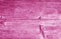 Wooden board texture in pink color