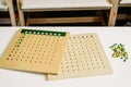 Wooden board to learn to count numbers and do mathematical operations Royalty Free Stock Photo
