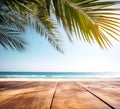 Wooden board on tropical beach. Sand and blue sky with palm leaf. Summer rest background with copy space. Created with generative