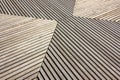 Wooden boards grey periodically perpendicular and parallel Royalty Free Stock Photo