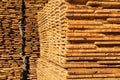 Wooden boards at the sawmill. Stack of lumber of a wooden board from a tree. Industrial background Royalty Free Stock Photo