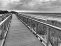 Wooden boardwalk along Baltic seaside in Darlowko Poland Royalty Free Stock Photo