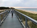 Wooden boardwalk along Baltic seaside in Darlowko Poland Royalty Free Stock Photo