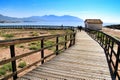 Wooden boardwalk along the beach in Isla Plana village Royalty Free Stock Photo