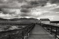 Wooden boardwalk along the beach in Isla Plana village Royalty Free Stock Photo