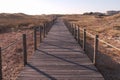 Wooden boardwalk over sand dunes in Vila do Conde protected nature area, Portugal Royalty Free Stock Photo