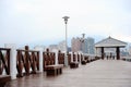 Wooden boardwalk with skyscrapers in background