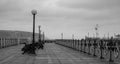 Wooden boardwalk with at Swanage Pier Dorset UK, photographed on a cold, windy day.