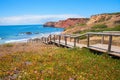 wooden boardwalk to bathing beach Praia do Amado, west Algarve, Portugal Royalty Free Stock Photo