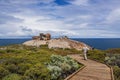 Wooden boardwalk to the Remarkable Rocks formation at Flinders Chase National Park on Kangaroo Island, Australia.