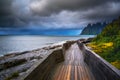Wooden boardwalk at Tungeneset beach on Senja island in northern Norway Royalty Free Stock Photo