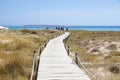 Wooden boardwalk and turquoise water at the Illetes beach in Formentera. Balearic Islands. Spain Royalty Free Stock Photo