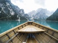 Nose of wooden boat at the alpine mountain lake. Lago di Braies, Dolomites Alps, Italy.