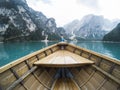 Nose of wooden boat at the alpine mountain lake. Lago di Braies, Dolomites Alps, Italy. Royalty Free Stock Photo