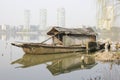 Wooden boat anchoring bank with its refelctor(Jiaxing,China)