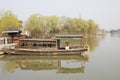 Wooden boat anchoring bank with its refelctor(Jiaxing,China)