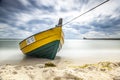 Wooden boat on The Baltic shore. Royalty Free Stock Photo