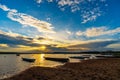 Wooden boat at banks of the river with sunset in Khonburi, Nahon Ratchasima, Thailand Royalty Free Stock Photo