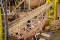 Wooden boat being built in workshop