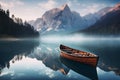 Wooden boat on the crystal lake with majestic mountain behind. Reflection in the water. Royalty Free Stock Photo