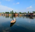 Wooden boat on the Dal Lake by boat in Srinagar, India Royalty Free Stock Photo