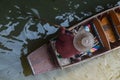 Wooden Boat in Damnoen Floating Market in Bangkok, Thailand