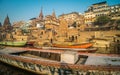 Colorful wooden boats docked along the shore of the Ganges River, at one of the many ghats in Varanasi, India. Royalty Free Stock Photo