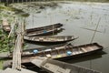 Wooden boat floating for travelers people rowing with Red lotus Royalty Free Stock Photo