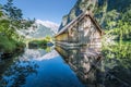 Wooden boat hut at the Obersee, Koenigssee, Bavaria, Germany