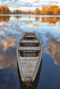 Wooden boat on the lake in autumn Royalty Free Stock Photo