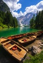 Wooden boat at lake Braies, Dolomites mountains, Italy Royalty Free Stock Photo