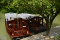 The wooden boat in the lake