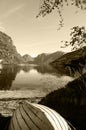 Wooden Boat at Mountains Lake - Sepia Landscape Royalty Free Stock Photo