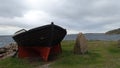 A wooden boat on the ocean coast in southern Sweden Royalty Free Stock Photo