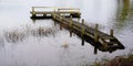 Wooden boat pontoon pier lake medoc of hourtin France Royalty Free Stock Photo