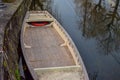 A wooden boat by the river bank Royalty Free Stock Photo