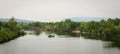 A wooden boat on the river in Saigon, Vietnam Royalty Free Stock Photo