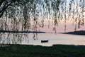 Wooden boat on the river during sunset Royalty Free Stock Photo