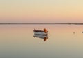 wooden boat sailing on the river in a fishing village Royalty Free Stock Photo