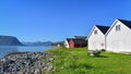 Wooden boat sheds at the shore of a fjord lake, Norway Royalty Free Stock Photo