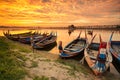 Wooden boat in Ubein Bridge at sunrise.