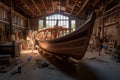 wooden boat under construction in workshop Royalty Free Stock Photo