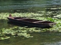 Wooden boat in the water Royalty Free Stock Photo