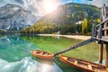 Wooden boats on the alpine lake, Dolomites, Italy, Europe